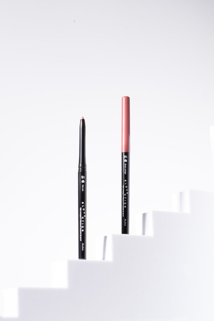 Beauty product photography with props on white background